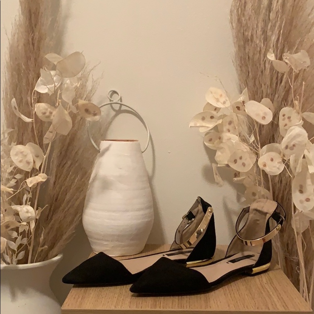 Black and gold flats
